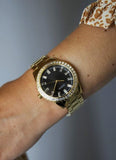  Shop Authentic Guess Sparkler Diamonds Black Dial Gold Steel Strap Watch for Women - GW0111L2 - Luxxuri
