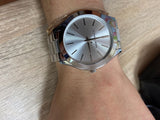  Shop Authentic Michael Kors Slim Runway Silver Dial Silver Stainless Steel Strap Watch for Women - MK3178 - Luxxuri