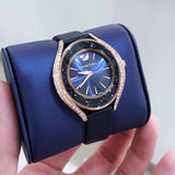  Shop Authentic Swarovski Crystalline Aura Blue Dial Blue Leather Strap Watch for Women - 5519447 - Luxxuri