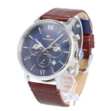  Shop Authentic Tommy Hilfiger Evan Chronograph Blue Dial Brown Leather Strap Watch for Men - 1710393 - Luxxuri