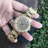  Shop Authentic Guess Sassy Analog Quartz Gold Dial Gold Steel Strap Watch For Women - W0705L2 - Luxxuri