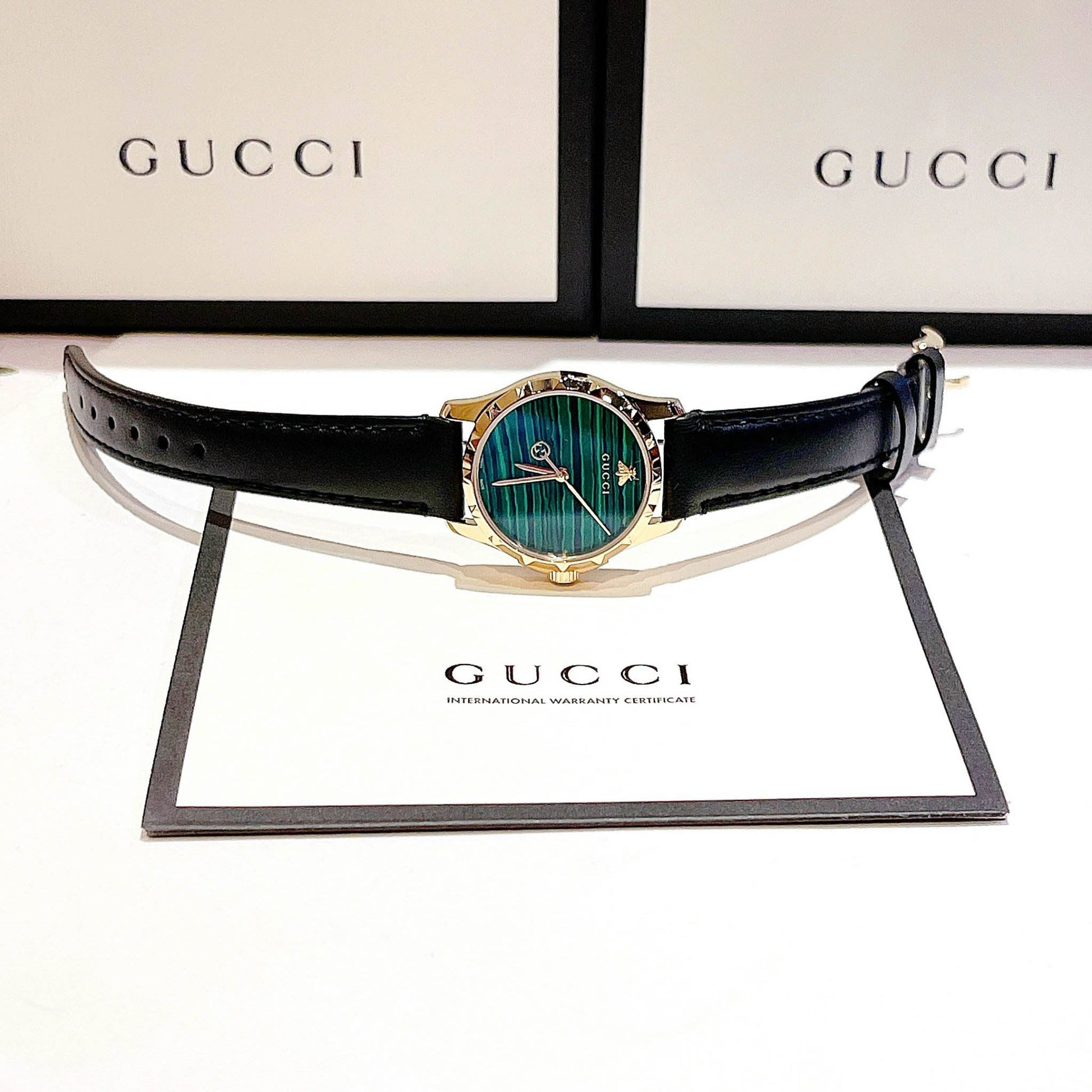 Shop Authentic Gucci Le Marche Des Merveilles Quartz Green Dial Black Leather Strap Watch For Women - YA126463 - Luxxuri
