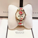  Shop Authentic Gucci G Timeless Floral Gold Dial White Leather Strap Watch For Women - YA1264084 - Luxxuri