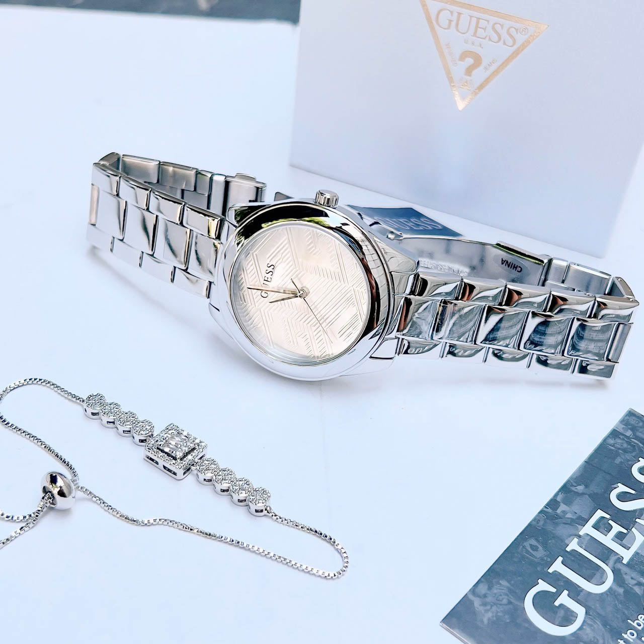  Shop Authentic Guess Cubed Analog Silver Dial Silver Steel Strap Watch For Women - GW0606L1 - Luxxuri