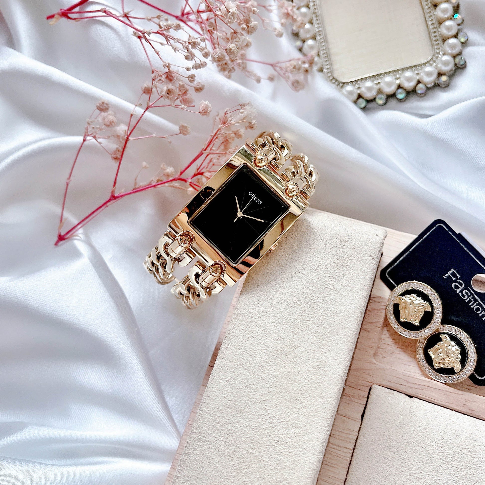  Shop Authentic Guess Trend Multi Chain Black Dial Gold Steel Strap Watch for Women - U1117L5 - Luxxuri