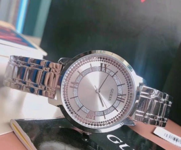  Shop Authentic Guess Montauk Silver Dial Stainless Steel Watch For Women - W0933L1 - Luxxuri