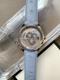  Shop Authentic Gucci G Timeless Automatic Mother of Pearl Dial Blue Leather Strap Watch For Women - YA1264113 - Luxxuri