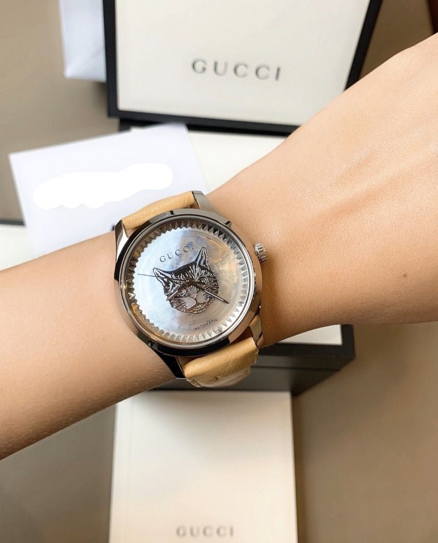  Shop Authentic Gucci G Timeless Automatic Mother of Pearl Dial Brown Leather Strap Watch For Women - YA1264112 - Luxxuri