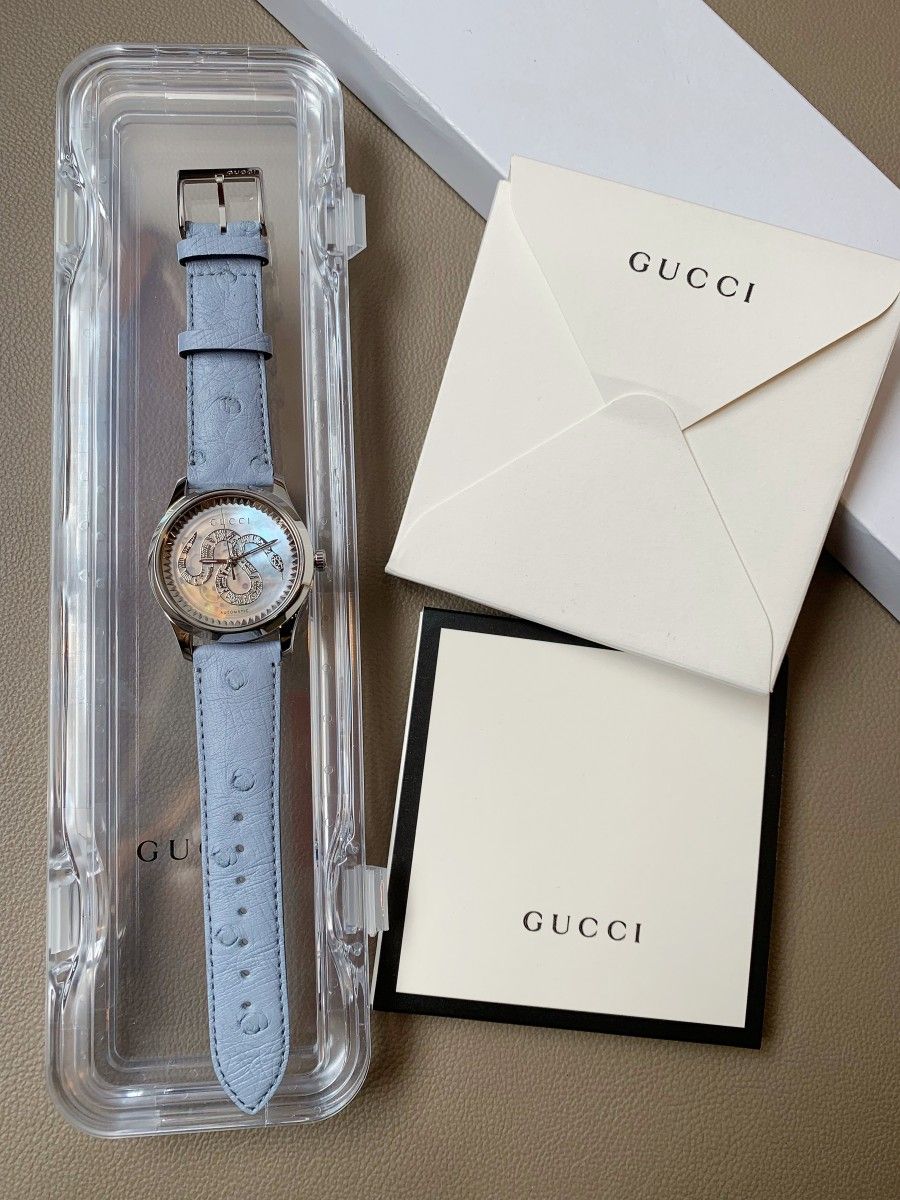  Shop Authentic Gucci G Timeless Automatic Mother of Pearl Dial Blue Leather Strap Watch For Women - YA1264113 - Luxxuri