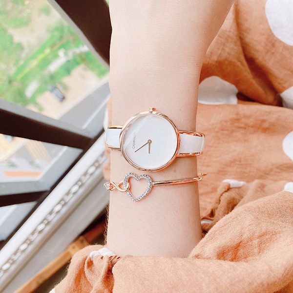  Shop Authentic Calvin Klein Seduce White Dial Two Tone Steel Strap Watch for Women - K4E2N616 - Luxxuri