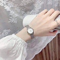  Shop Authentic Calvin Klein Minimal White Dial Silver Mesh Bracelet Watch for Women - K3M23126 - Luxxuri