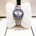  Shop Authentic Gucci Grip Vintage Silver Stainless Steel Quartz Unisex Watch 35mm - YA152401 - Luxxuri