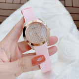  Shop Authentic Guess Clarity Gold Dial Pink Silicone Strap Watch for Women - GW0109L2 - Luxxuri
