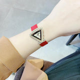  Shop Authentic Guess Fame Quartz Gold Dial Red Leather Strap Watch For Women - GW0504L2 - Luxxuri