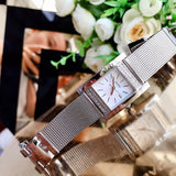  Shop Authentic Guess Nouveau Diamonds Silver Dial Silver Mesh Bracelet Watch for Women - W0127L1 - Luxxuri