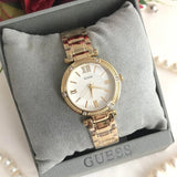  Shop Authentic Guess Park Ave South Analog White Dial Gold Steel Strap Watch For Women - W0767L2 - Luxxuri