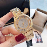  Shop Authentic Guess Analog Diamonds Silver Dial Gold Steel Strap Watch For Women - W1013l2 - Luxxuri