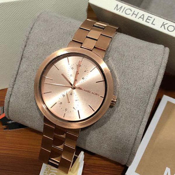  Shop Authentic Michael Kors Garner Quartz Rose Gold Dial Rose Gold Steel Strap Watch For Women - MK6409 - Luxxuri