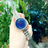  Shop Authentic Swarovski Cosmopolitan Blue Dial Silver Steel Strap Watch for Women - 5517790 - Luxxuri