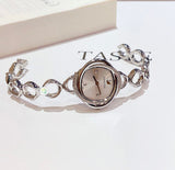  Shop Authentic Swarovski Crystal Flower Silver Dial Silver Steel Strap Watch for Women - 5547622 - Luxxuri