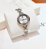  Shop Authentic Swarovski Crystal Flower Silver Dial Silver Steel Strap Watch for Women - 5547622 - Luxxuri
