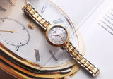  Shop Authentic Tissot T Lady Flamingo Mother of Pearl White Dial Two Tone Steel Strap Watch For Women - T094.210.22.111.00 - Luxxuri