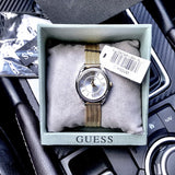  Shop Authentic Guess Whisper Silver Dial Gold Mesh Bracelet Watch for Women - W1084L2 - Luxxuri
