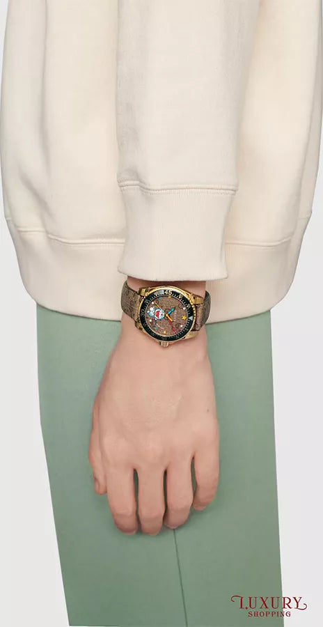  Shop Authentic Gucci Dive Doraemon Quartz Brown Dial Brown Leather Strap Watch For Men - YA136335 - Luxxuri