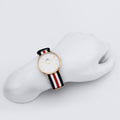  Shop Authentic Daniel Wellington Classic Canterbury White Dial Two Tone Nylon Strap Watch For Men - DW00100002 - Luxxuri