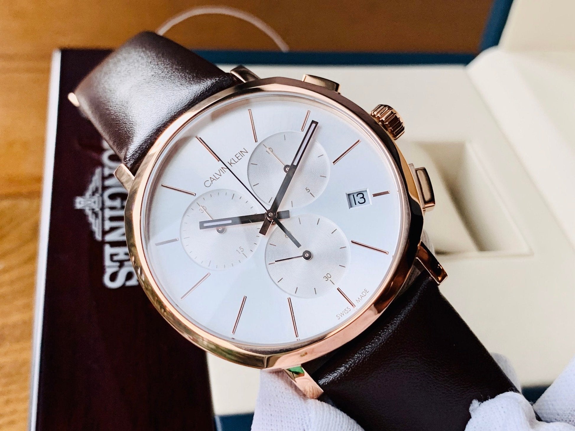  Shop Authentic Calvin Klein Posh Chronograph White Dial Brown Leather Strap Watch for Men - K8Q376G6 - Luxxuri