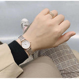  Shop Authentic Emporio Armani Gianni Mother of Pearl Dial Two Tone Steel Strap Watch For Women - AR1764 - Luxxuri