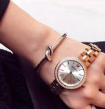  Shop Authentic Swarovski Daytime Analog Gold Dial Gold Steel Strap Watch for Women - 5182231 - Luxxuri