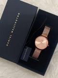  Shop Authentic Daniel Wellington Petite Rose Gold Dial Rose Gold Mesh Bracelet Watch For Women - DW00100471 - Luxxuri