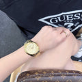  Shop Authentic Guess Cubed Analog Gold Dial Gold Steel Strap Watch For Women - GW0606L2 - Luxxuri