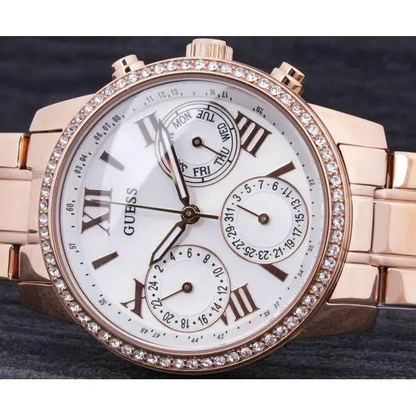  Shop Authentic Guess Mini Surprise Analog Silver Dial Rose Gold Steel Strap Watch For Women - W0623L2 - Luxxuri