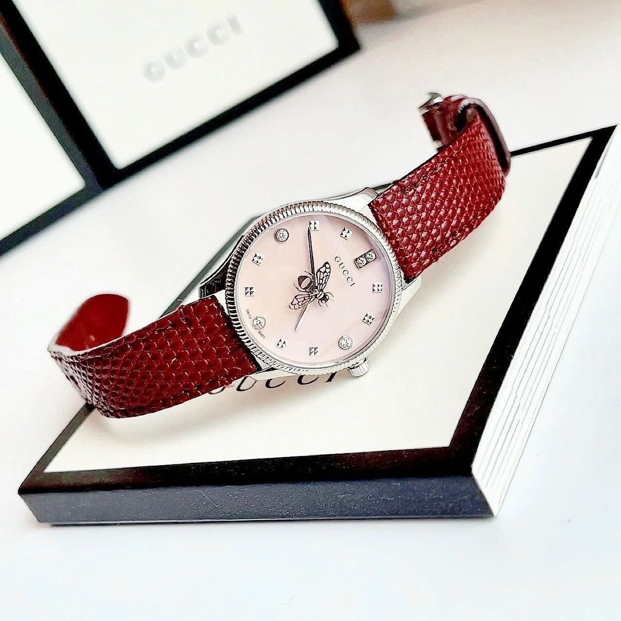  Shop Authentic Gucci G Timeless Quartz Diamonds Pink Dial Red Leather Strap Watch For Women - YA1265017 - Luxxuri