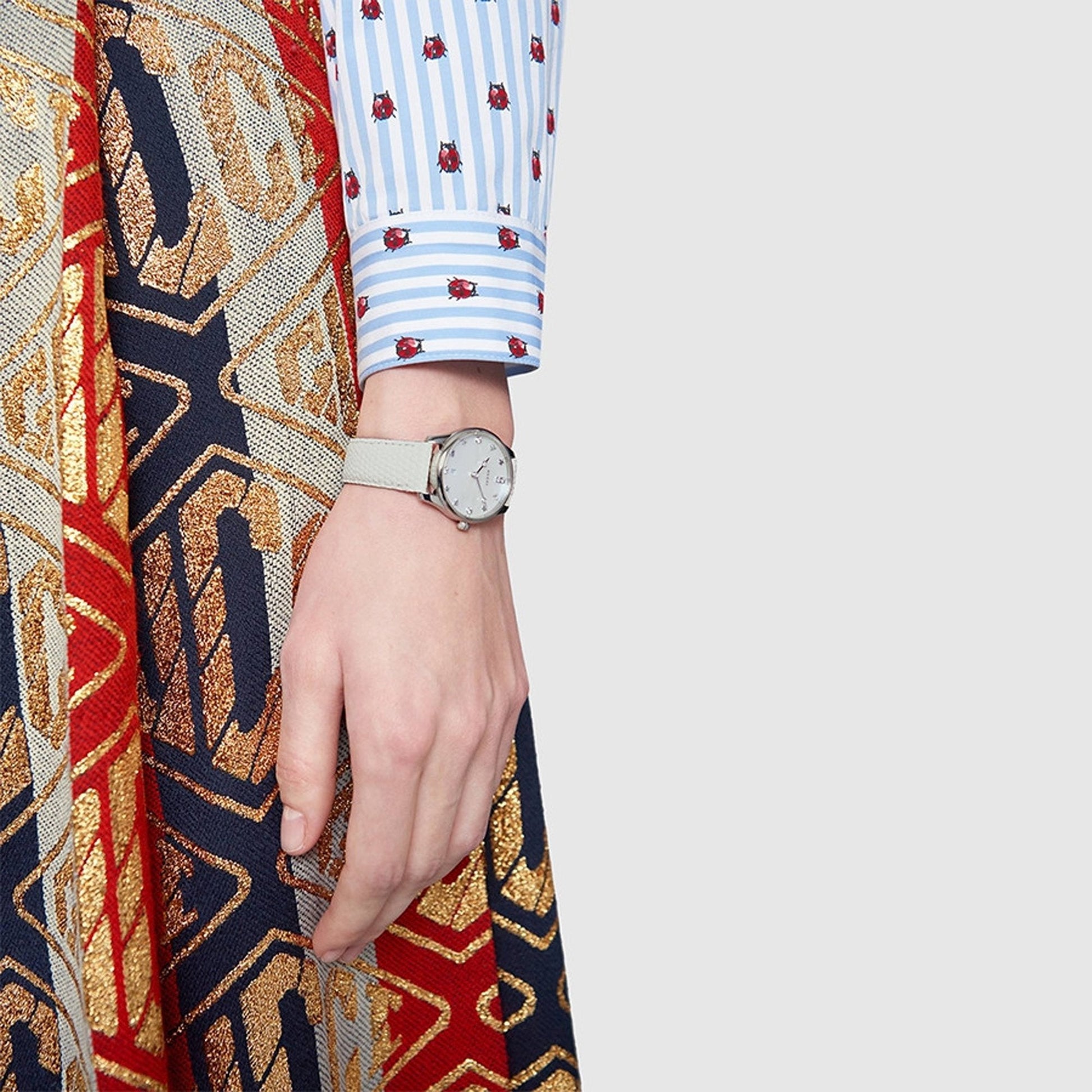  Shop Authentic Gucci G-Timeless Mother of Pearl White Dial White Leather Strap Watch For Women - YA126597 - Luxxuri