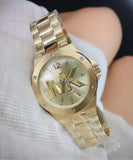  Shop Authentic Michael Kors Lennox Three-Hand Quartz Gold Dial Gold Steel Strap Watch For Men - MK8939 - Luxxuri