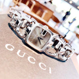  Shop Authentic Gucci G Brown Square Brown Dial Silver Steel Strap Watch For Women - YA125402 - Luxxuri
