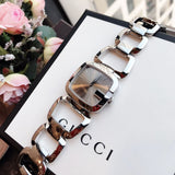  Shop Authentic Gucci G Brown Square Brown Dial Silver Steel Strap Watch For Women - YA125402 - Luxxuri
