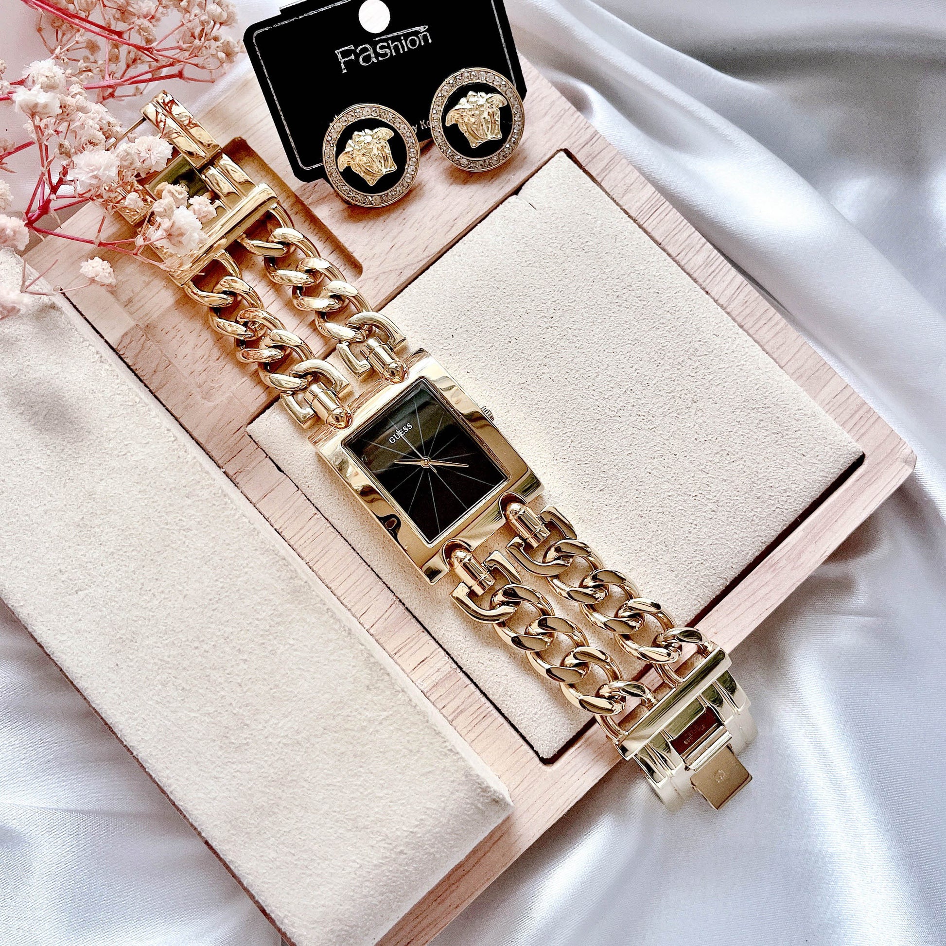  Shop Authentic Guess Trend Multi Chain Black Dial Gold Steel Strap Watch for Women - U1117L5 - Luxxuri