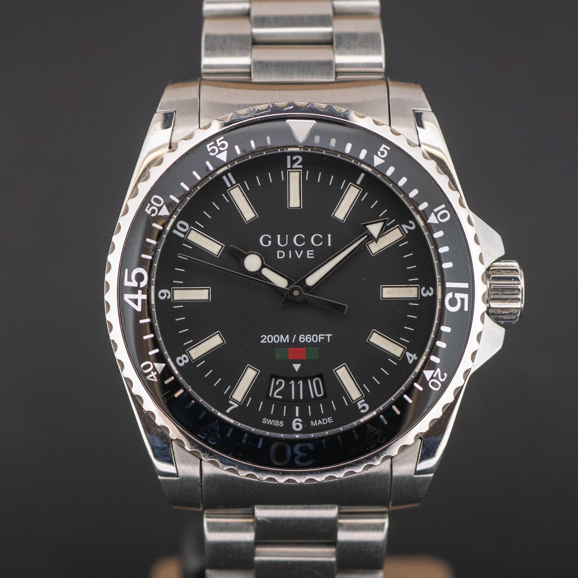  Shop Authentic Gucci Dive Quartz Black Dial Silver Steel Strap Watch For Men - YA136301A - Luxxuri