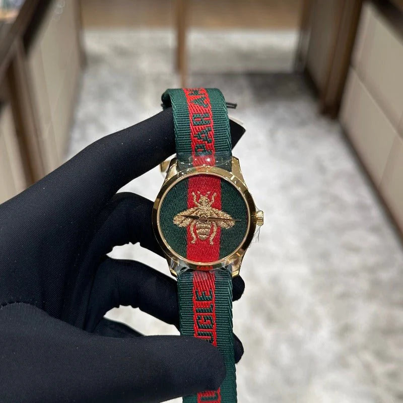 Shop Authentic Gucci G Timeless Quartz Green & Red Dial Green & Red NATO Strap Watch For Men - YA126487A - Luxxuri
