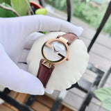  Shop Authentic Gucci G Interlocking Mother of Pearl Dial Brown Leather Strap Watch For Women - YA133516 - Luxxuri