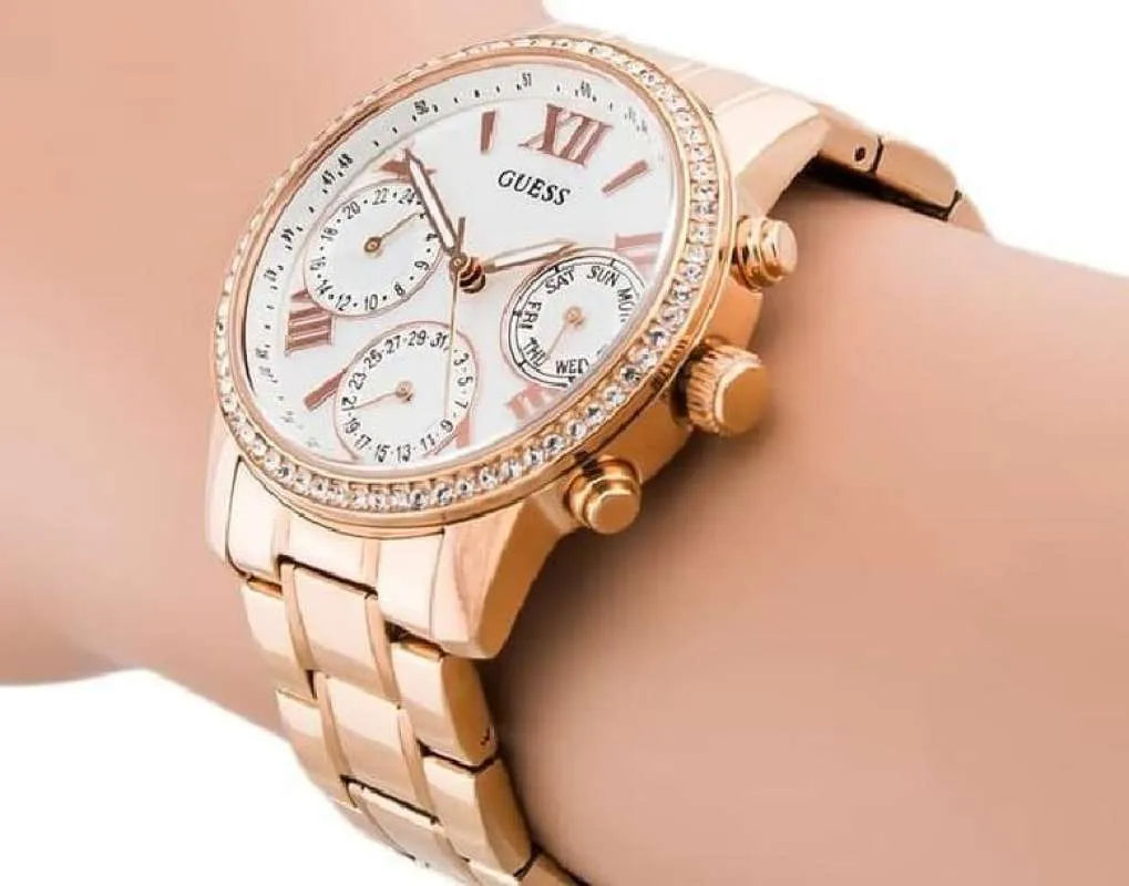  Shop Authentic Guess Mini Surprise Analog Silver Dial Rose Gold Steel Strap Watch For Women - W0623L2 - Luxxuri