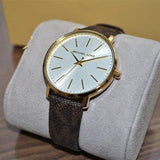  Shop Authentic Michael Kors Pyper Quartz Silver Dial Brown Leather Strap Watch For Women - MK2857 - Luxxuri