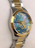 Shop Authentic Gucci G Timeless Quartz Mother of Pearl Blue Dial Two Tone Steel Strap Watch For Women - YA1265011 - Luxxuri