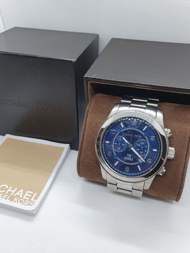  Shop Authentic Michael Kors Stop Hunger Chronograph Blue Dial Silver Steel Strap Watch for Men - MK8314 - Luxxuri