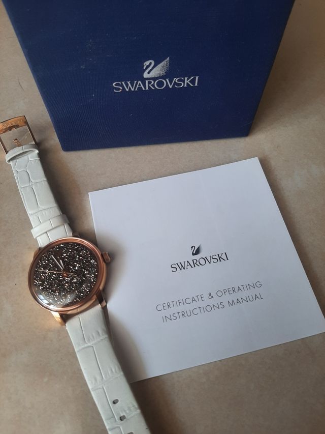  Shop Authentic Swarovski Crystalline Hours Quartz Grey Dial Black Leather Strap Watch for Women - 5344635 - Luxxuri