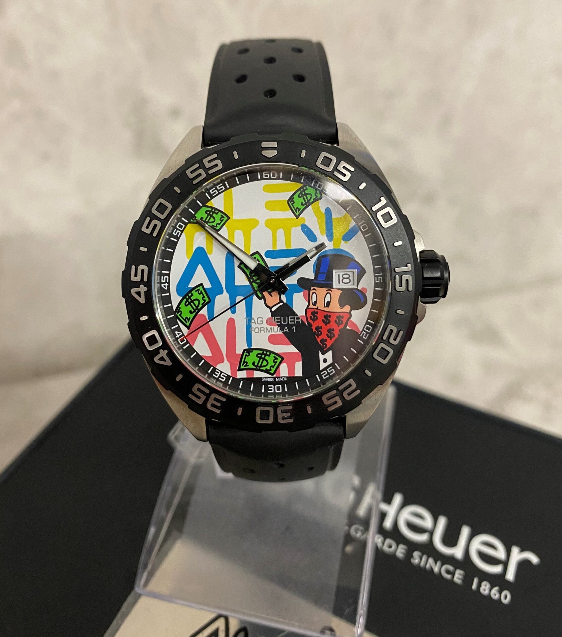  Shop Authentic Tag Heuer Formula 1 Alec Monopoly White Dial Watch for Men - WAZ1119.FT8023 - Luxxuri